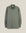 A long-sleeve button-down shirt in a muted sage green color, featuring a chest pocket and silver-toned buttons, displayed against a solid light beige background.  Made in USA Oxford Cloth Button Down shirt.