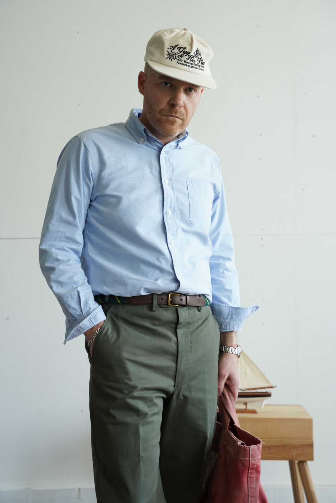 Men's Bristol light blue Oxford button-down shirt worn untucked